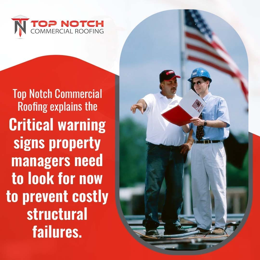 Roofing professionals reviewing inspection report on commercial rooftop to prevent structural damage